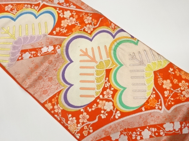 Woven pouch obi with pine, plum, and weeping cherry blossom patterns